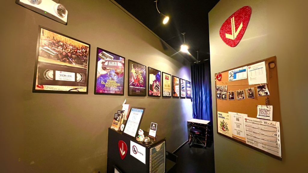 Vinnie Classroom wall of past recital posters